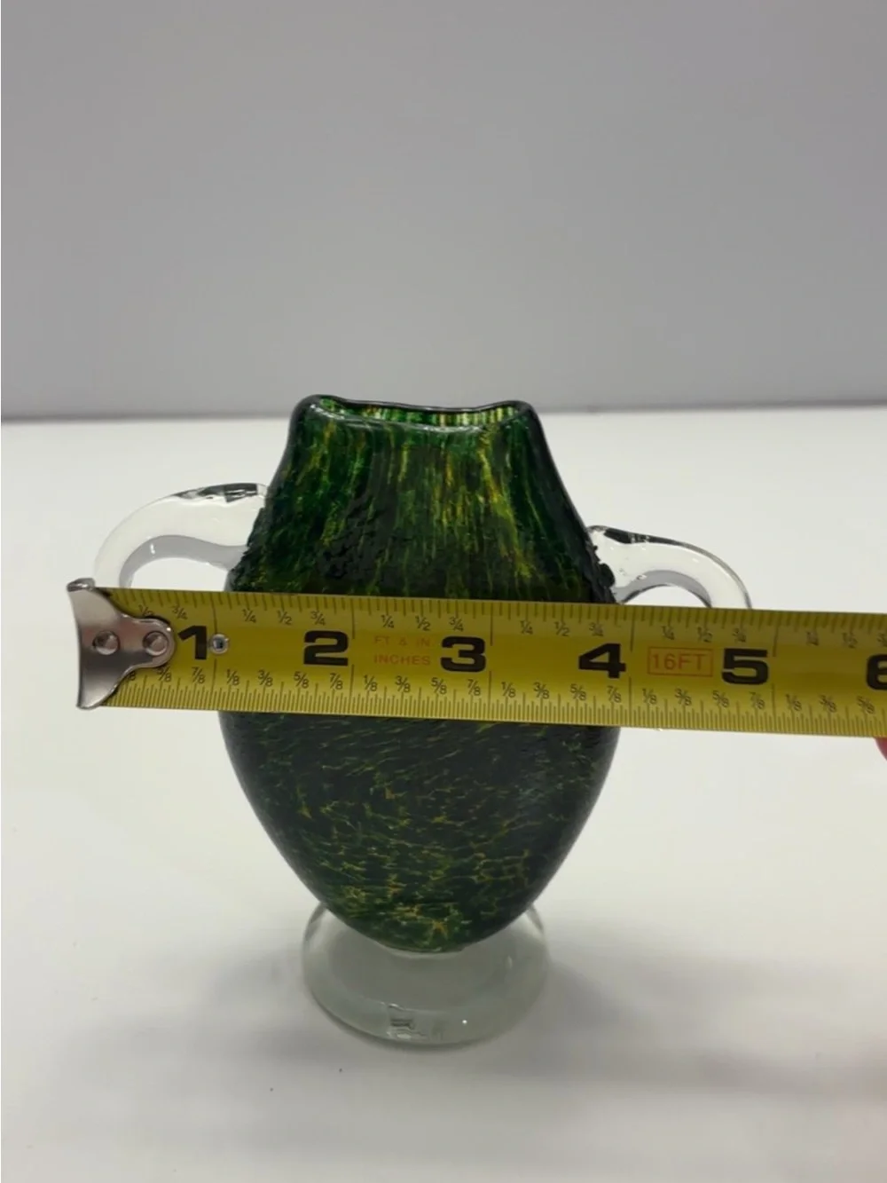 vintage glass vase from Osaka features a dark green, speckled design